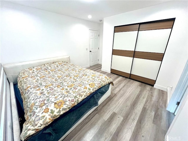 125 Campanita Ct, Monterey Park, CA 91754 - bedroom featuring wood finished floors, recessed lighting, and a closet