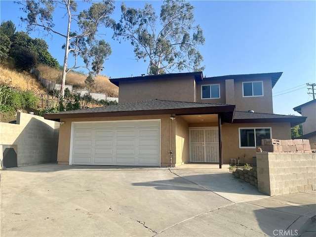 125 Campanita Ct, Monterey Park, CA 91754 - townhome / multi-family property with stucco siding, driveway, and a garage
