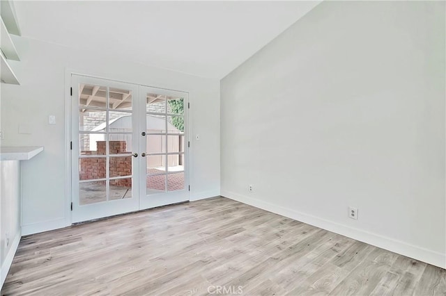6470 Flamingo Dr, Buena Park, CA 90620 - unfurnished room featuring french doors and light wood-style floors