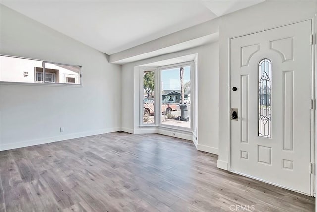 6470 Flamingo Dr, Buena Park, CA 90620 - foyer entrance featuring wood finished floors and vaulted ceiling
