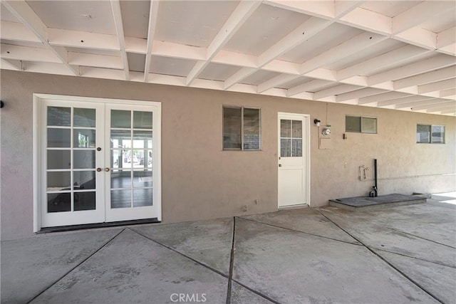 6470 Flamingo Dr, Buena Park, CA 90620 - view of exterior entry featuring french doors, a patio, and stucco siding