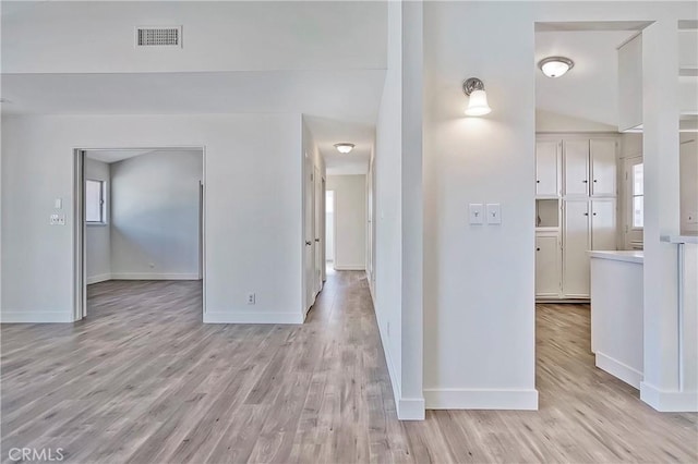 6470 Flamingo Dr, Buena Park, CA 90620 - corridor featuring light wood-type flooring and baseboards