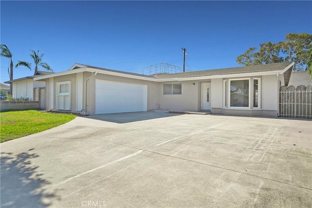 6470 Flamingo Dr, Buena Park, CA 90620 - ranch-style home with a garage, concrete driveway, stucco siding, and a front lawn