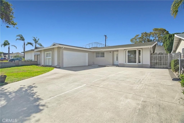 6470 Flamingo Dr, Buena Park, CA 90620 - single story home with an attached garage, stucco siding, and driveway