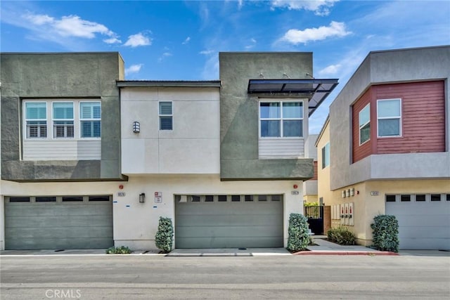 10578 Wells Dr, Rancho Cucamonga, CA 91730 - view of front facade with an attached garage and stucco siding
