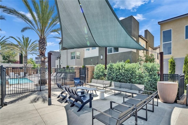 10578 Wells Dr, Rancho Cucamonga, CA 91730 - view of patio / terrace featuring a community pool and an outdoor hangout area