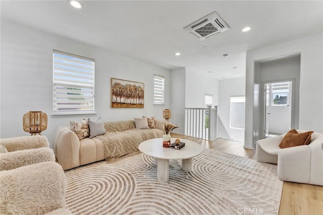10578 Wells Dr, Rancho Cucamonga, CA 91730 - living room featuring light wood-style flooring and recessed lighting