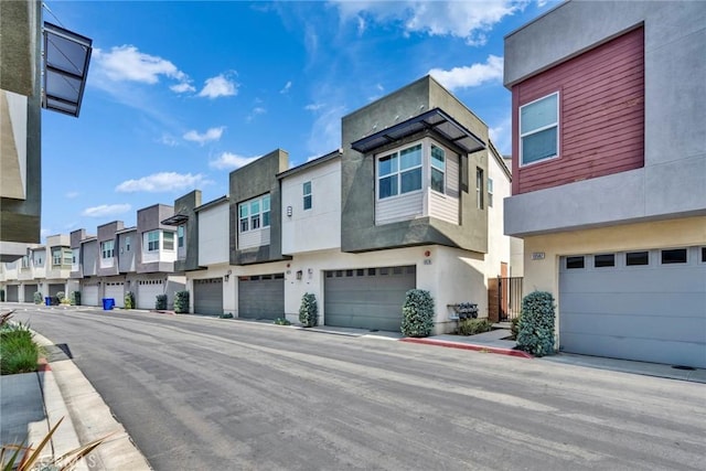 10578 Wells Dr, Rancho Cucamonga, CA 91730 - view of asphalt road featuring a residential view, sidewalks, and curbs