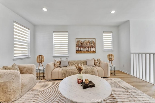 10578 Wells Dr, Rancho Cucamonga, CA 91730 - living area featuring wood finished floors and recessed lighting
