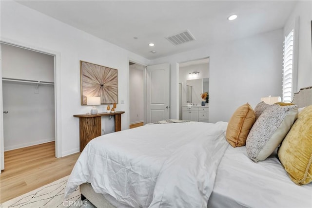 10578 Wells Dr, Rancho Cucamonga, CA 91730 - bedroom with wood finished floors, recessed lighting, a closet, ensuite bathroom, and a spacious closet