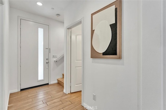10578 Wells Dr, Rancho Cucamonga, CA 91730 - foyer entrance with light wood finished floors, stairs, and recessed lighting