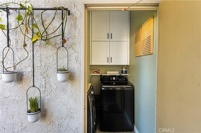 314 Molokai Dr, Placentia, CA 92870 - kitchen featuring washer / clothes dryer and white cabinets