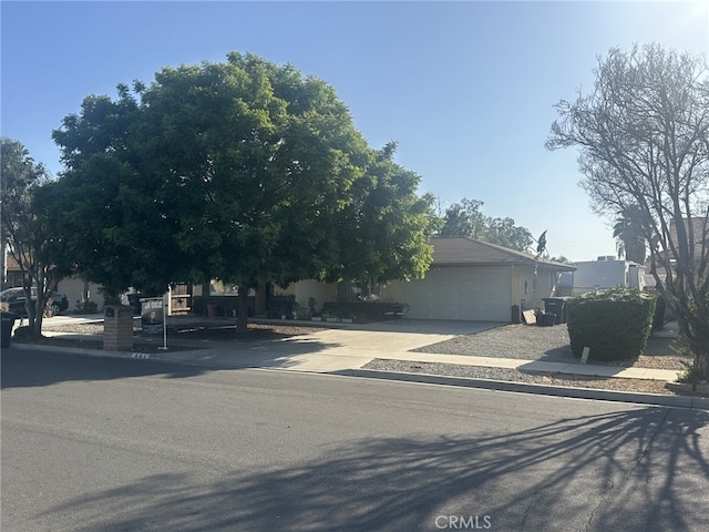 621 Brian St, Hemet, CA 92544 - obstructed view of property with a garage and driveway