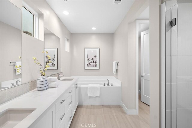 160 Mirth, Irvine, CA 92618 - full bath with a bath, double vanity, recessed lighting, and a shower with door