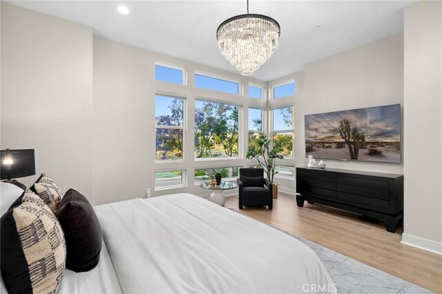160 Mirth, Irvine, CA 92618 - bedroom featuring light wood-style floors, a chandelier, and recessed lighting