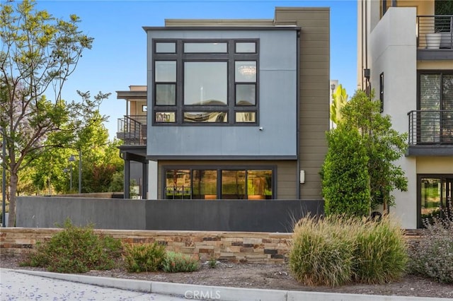 160 Mirth, Irvine, CA 92618 - rear view of house with a balcony