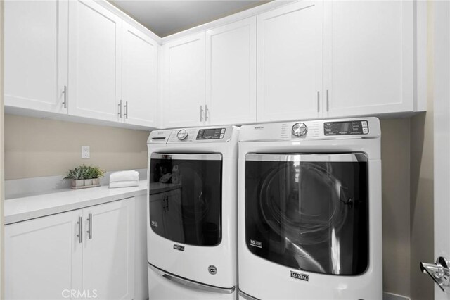 160 Mirth, Irvine, CA 92618 - laundry area featuring cabinet space and independent washer and dryer