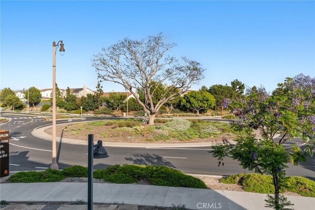 160 Mirth, Irvine, CA 92618 - view of asphalt road featuring street lights, sidewalks, and curbs