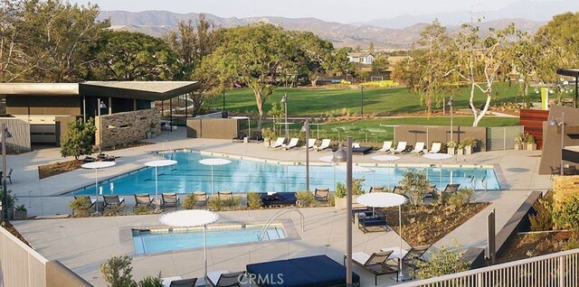 160 Mirth, Irvine, CA 92618 - community pool with a mountain view and a patio area