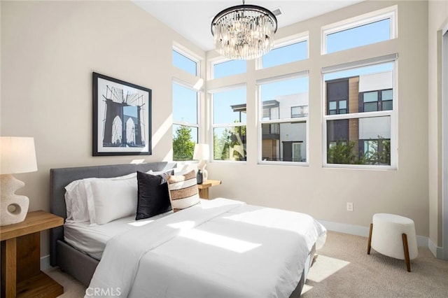 160 Mirth, Irvine, CA 92618 - carpeted bedroom featuring a chandelier and baseboards