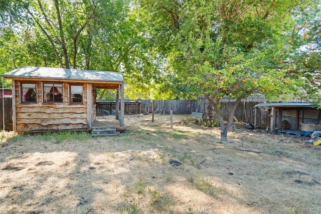 6685 Navajoa Ave, Atascadero, CA 93422 - fenced backyard featuring an outbuilding and exterior structure