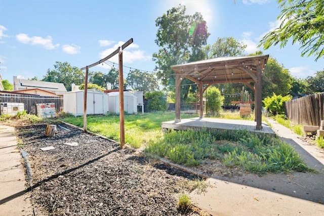 6685 Navajoa Ave, Atascadero, CA 93422 - fenced backyard featuring a gazebo and a storage shed