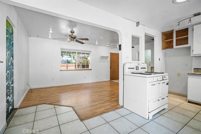 6685 Navajoa Ave, Atascadero, CA 93422 - kitchen featuring white range, ceiling fan, light wood-type flooring, white cabinetry, and open shelves