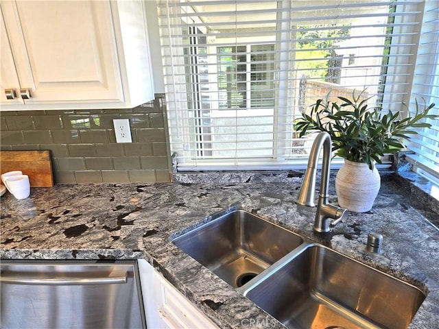 868 Ethelinda Way, Brea, CA 92821 - kitchen view of dishwasher, tasteful backsplash, dark stone counters, and white cabinets