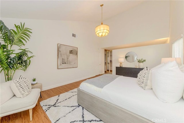 868 Ethelinda Way, Brea, CA 92821 - bedroom featuring wood finished floors and high vaulted ceiling