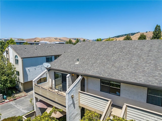 39239 Walnut Ter, Fremont, CA 94536 - exterior view of roof with shingles and stucco siding