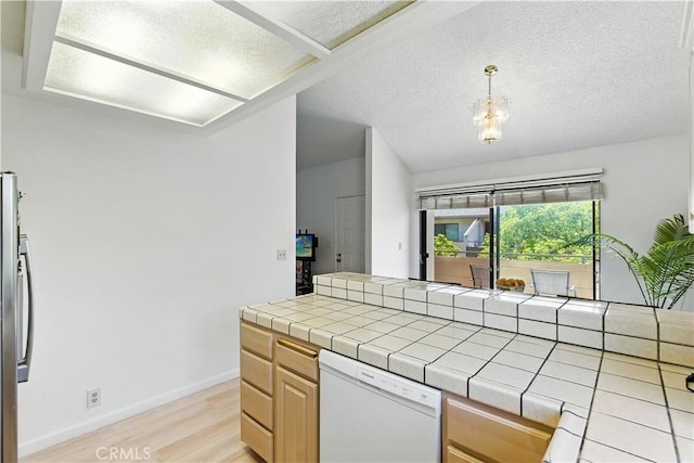 39239 Walnut Ter, Fremont, CA 94536 - kitchen featuring white dishwasher, light wood-type flooring, tile countertops, light brown cabinetry, and a textured ceiling