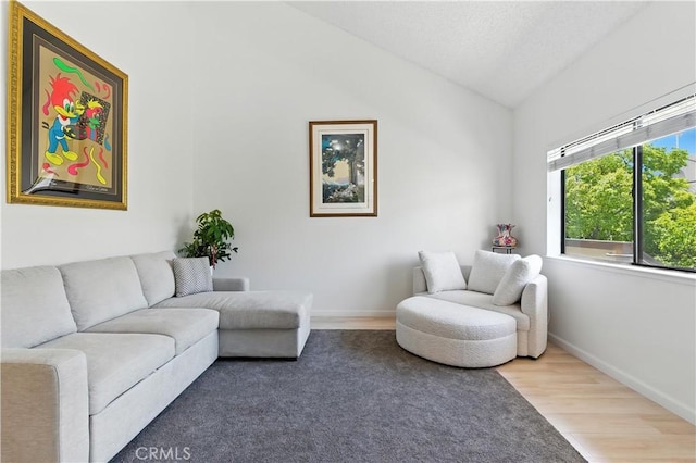 39239 Walnut Ter, Fremont, CA 94536 - living room with vaulted ceiling and wood finished floors