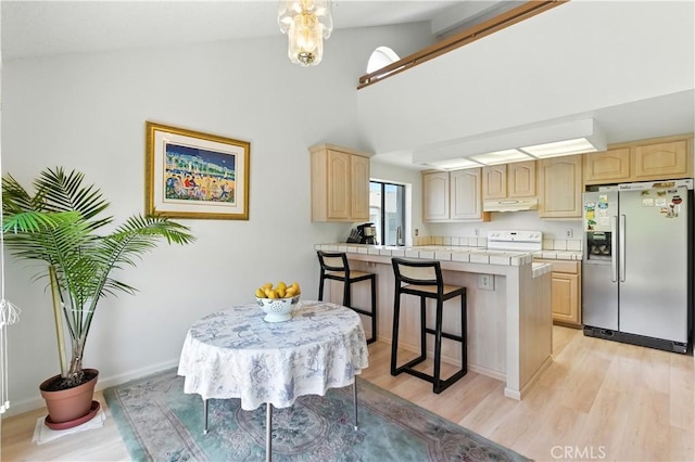 39239 Walnut Ter, Fremont, CA 94536 - dining area with light wood-style flooring and high vaulted ceiling