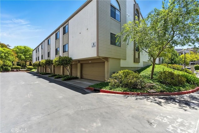 39239 Walnut Ter, Fremont, CA 94536 - view of building exterior featuring an attached garage