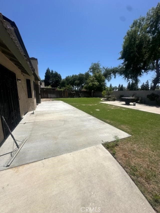 3105 Whisper Oak Way, Bakersfield, CA 93311 - fenced backyard featuring a patio
