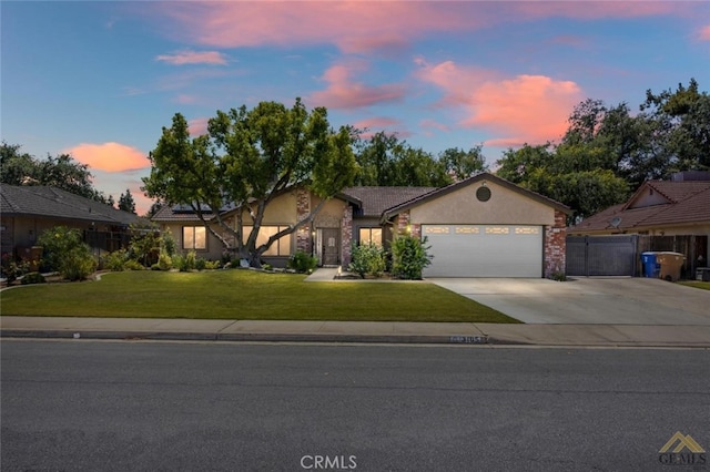 3105 Whisper Oak Way, Bakersfield, CA 93311 - ranch-style house with a garage, driveway, and stucco siding