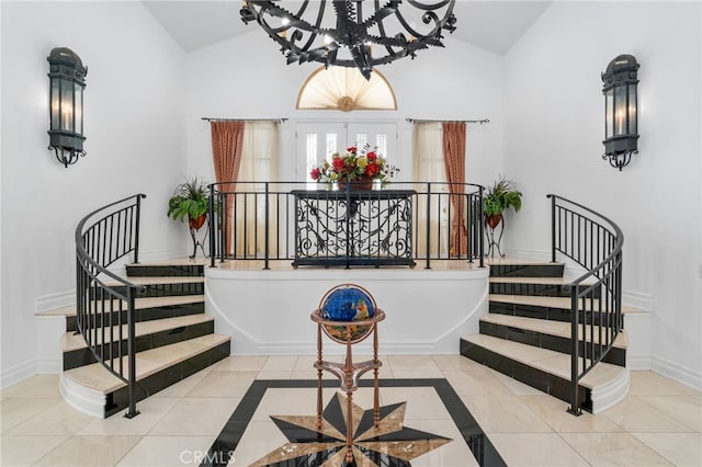 43110 Palomino Cir, Temecula, CA 92590 - foyer entrance with a chandelier, stairs, tile patterned flooring, and high vaulted ceiling
