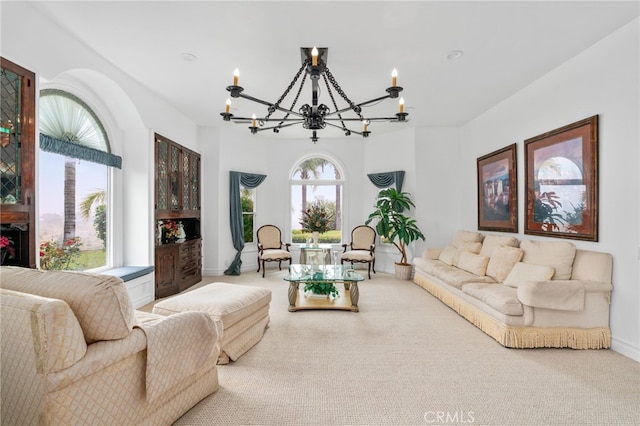 43110 Palomino Cir, Temecula, CA 92590 - carpeted living room with a chandelier and baseboards