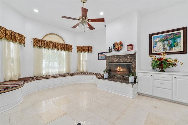 43110 Palomino Cir, Temecula, CA 92590 - unfurnished living room featuring a fireplace, ceiling fan, light tile patterned floors, and recessed lighting