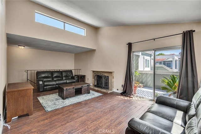 960 Golden Springs Dr Unit G, Diamond Bar, CA 91765 - living area featuring wood finished floors, plenty of natural light, a high end fireplace, and a high ceiling
