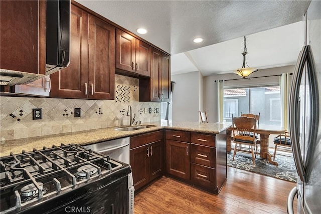 960 Golden Springs Dr Unit G, Diamond Bar, CA 91765 - kitchen featuring appliances with stainless steel finishes, wood finished floors, a peninsula, decorative backsplash, and recessed lighting