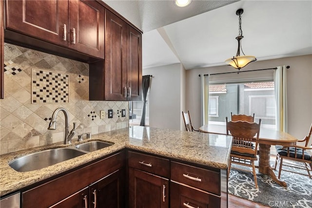 960 Golden Springs Dr Unit G, Diamond Bar, CA 91765 - kitchen with tasteful backsplash, a peninsula, pendant lighting, and light stone countertops