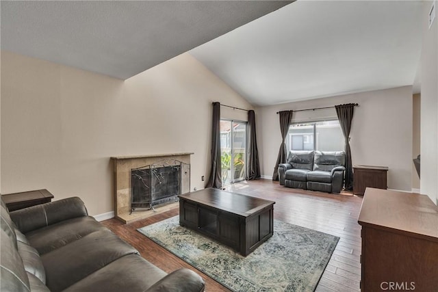 960 Golden Springs Dr Unit G, Diamond Bar, CA 91765 - living room featuring vaulted ceiling, a fireplace, and wood finished floors