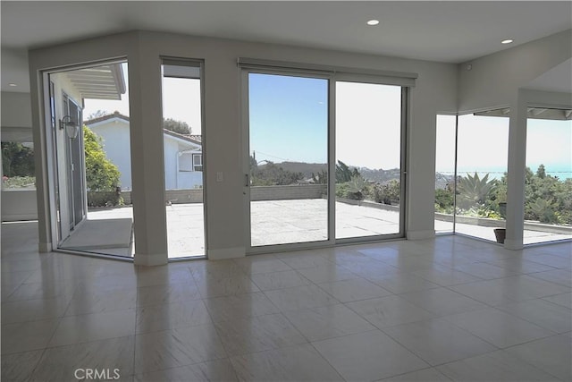 2615 Temple Hills Dr, Laguna Beach, CA 92651 - doorway featuring healthy amount of natural light, recessed lighting, and tile patterned floors