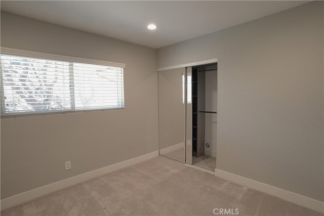 2615 Temple Hills Dr, Laguna Beach, CA 92651 - unfurnished bedroom featuring light colored carpet, a closet, and recessed lighting