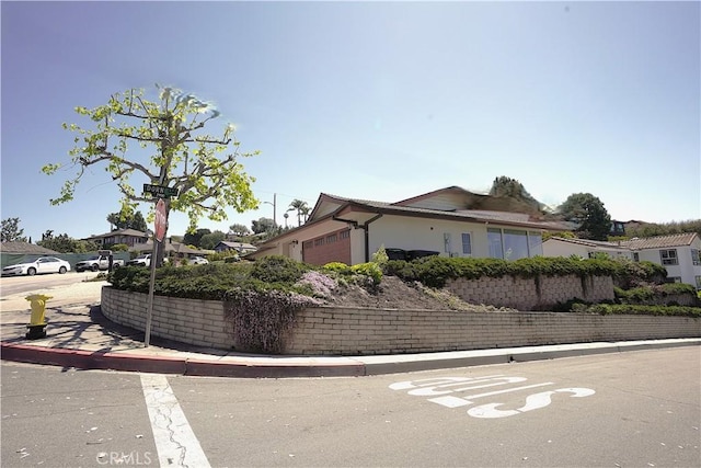2615 Temple Hills Dr, Laguna Beach, CA 92651 - view of front of house featuring a garage and stucco siding