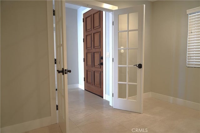 2615 Temple Hills Dr, Laguna Beach, CA 92651 - corridor featuring french doors and light tile patterned floors