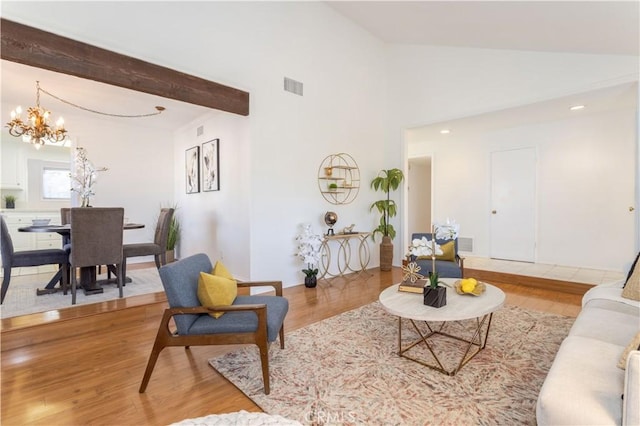 2217 E Brower St, Simi Valley, CA 93065 - living room featuring a chandelier, lofted ceiling, and wood finished floors