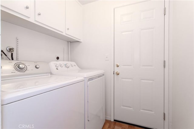 2217 E Brower St, Simi Valley, CA 93065 - laundry room with washing machine and clothes dryer, cabinet space, and wood finished floors