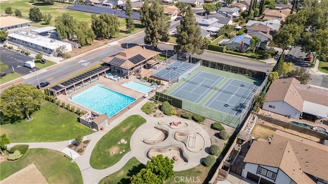 2217 E Brower St, Simi Valley, CA 93065 - aerial overview of property's location featuring a pool area and nearby suburban area